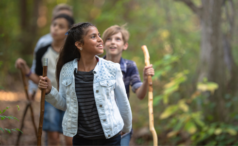 a group of kids hiking